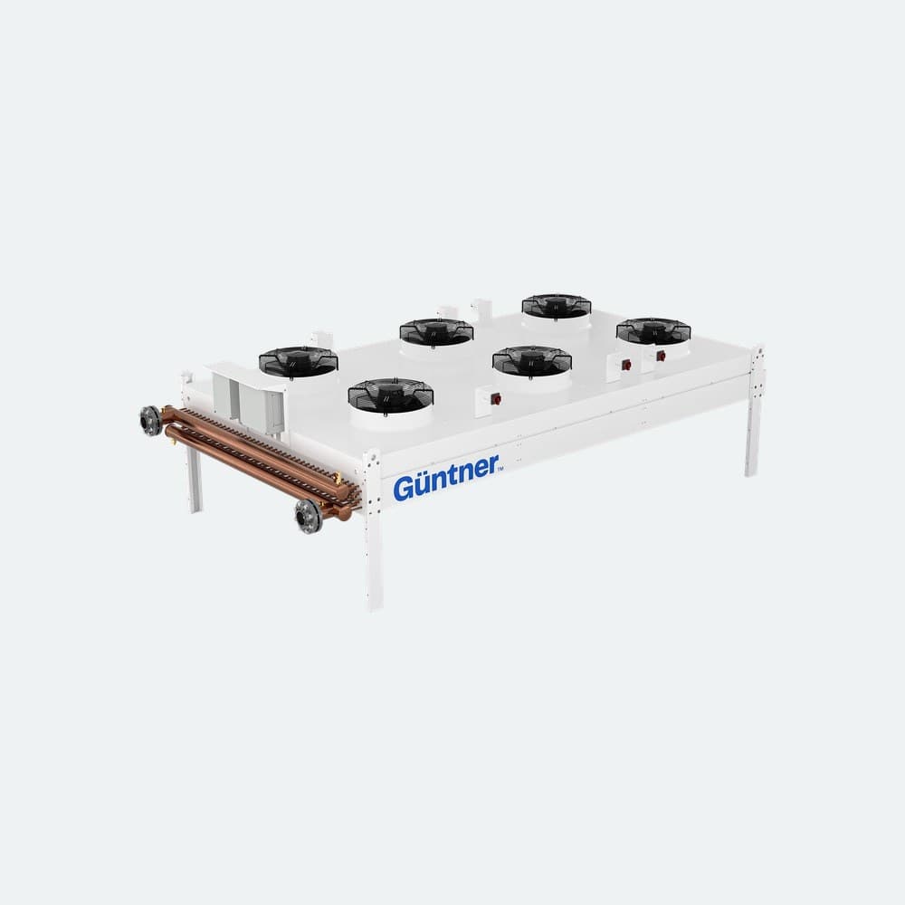 White industrial heat-exchanger frame with blue GÜNTNER branding and exposed copper tubing; two cooling fans atop the unit.