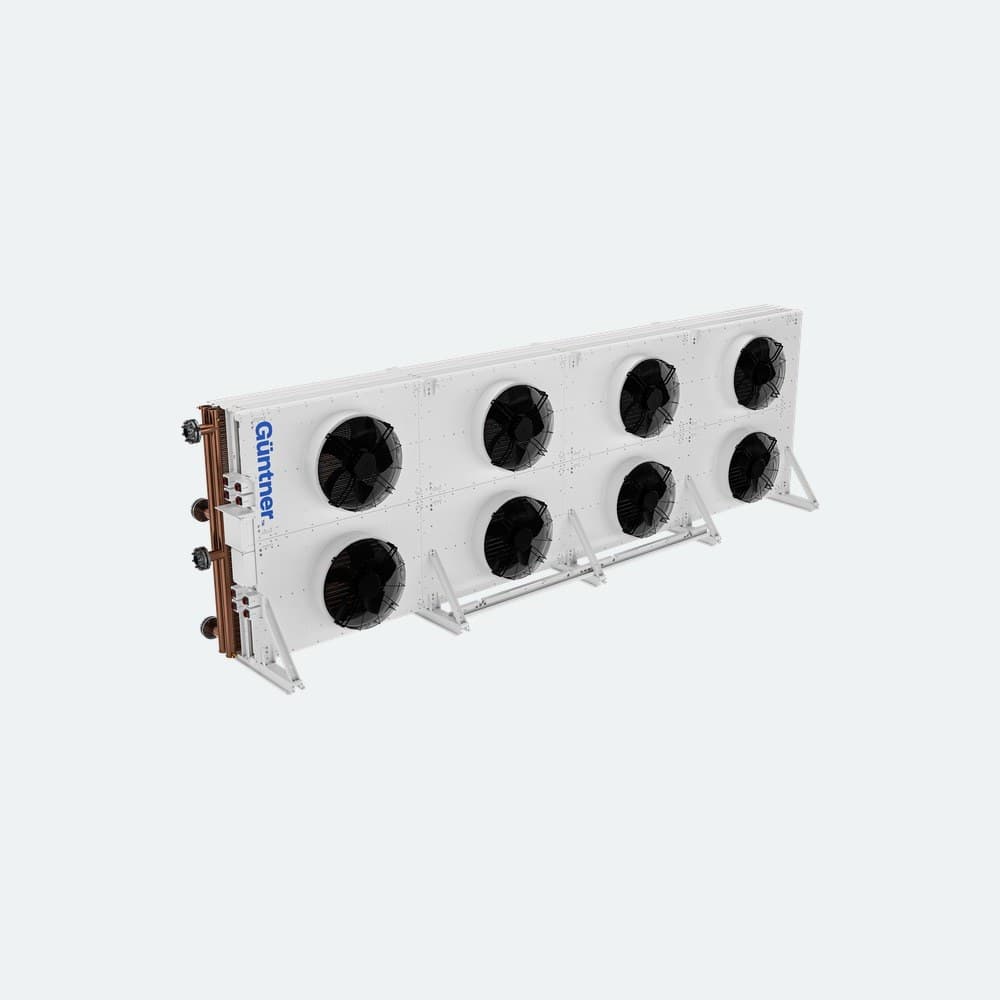 Long white industrial cooling unit with multiple large black fans on a panel, copper pipes at the left, and the Guntner logo visible.