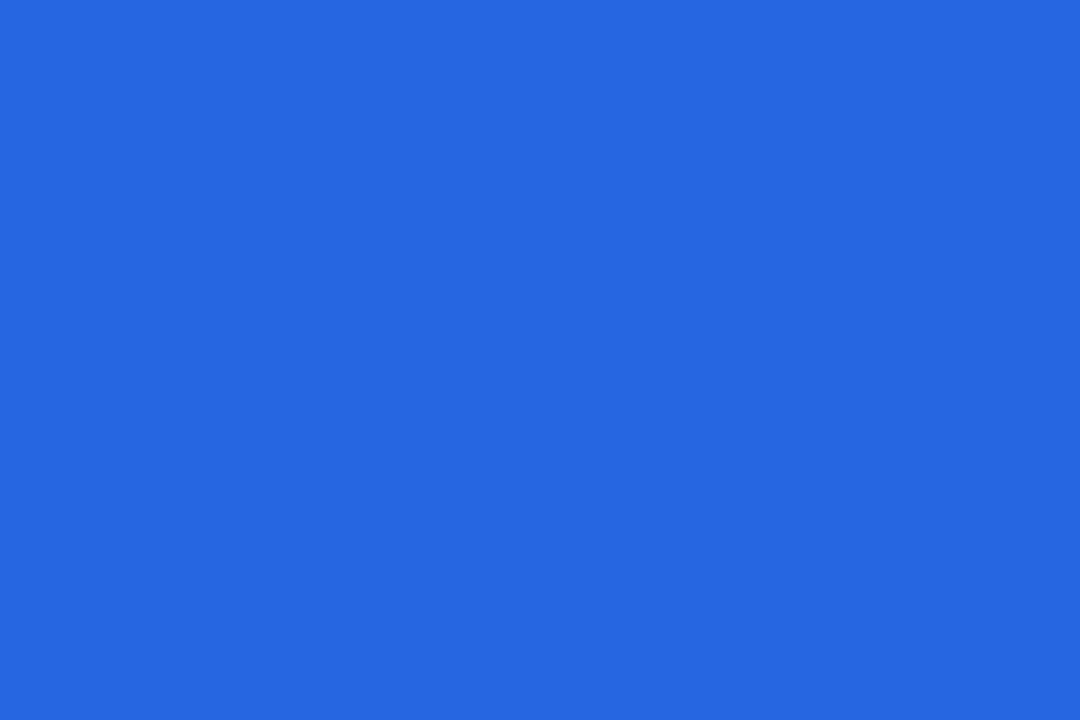 Uniform royal blue background with no objects or text.