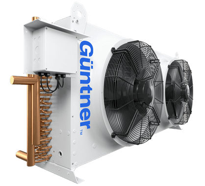 White industrial heat exchanger unit with two large front-mounted fans and exposed copper cooling pipes on the left; blue Guntner branding on the side.